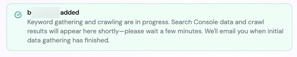 Confirmation notice after adding a website, indicating that data gathering and crawling are in progress.